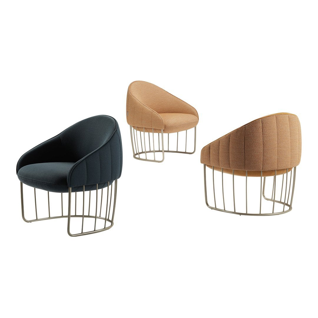 Three contemporary chairs in navy, tan, and light orange upholstery; stylish wire frames with unique shapes.