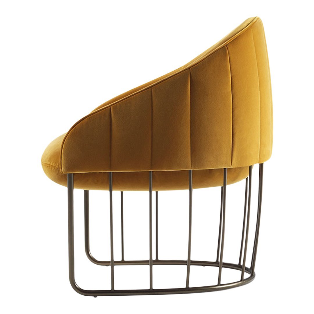 Velvet mustard-yellow chair with vertical stitching and a sleek black metal base. Perfect for modern decor.