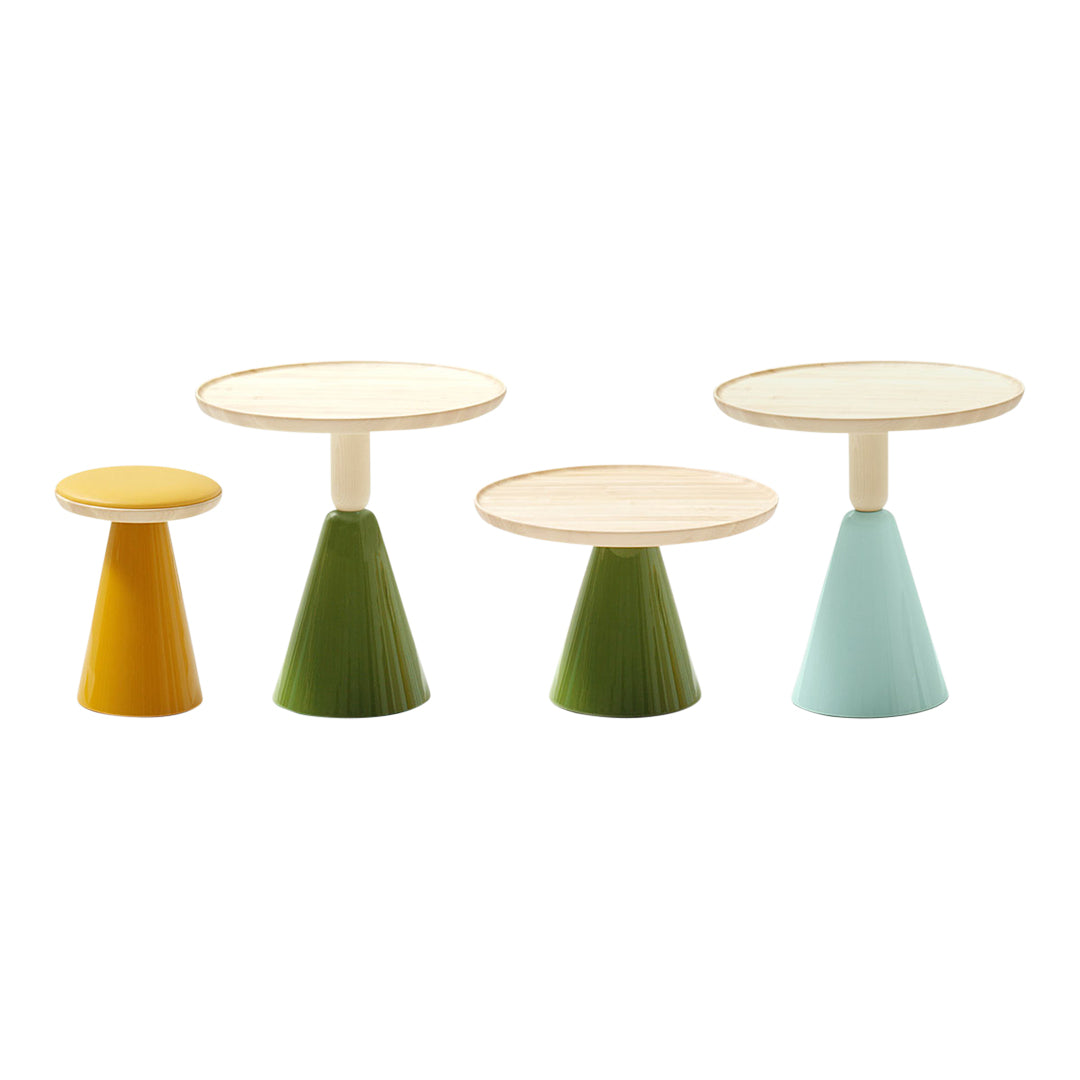 Four modern side tables in yellow, green, and blue with minimalistic round tops and textured bases. Perfect for any decor.