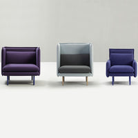 Modern armchairs in rich purple, soft gray, and deep blue upholstery with minimalist design and wooden legs.
