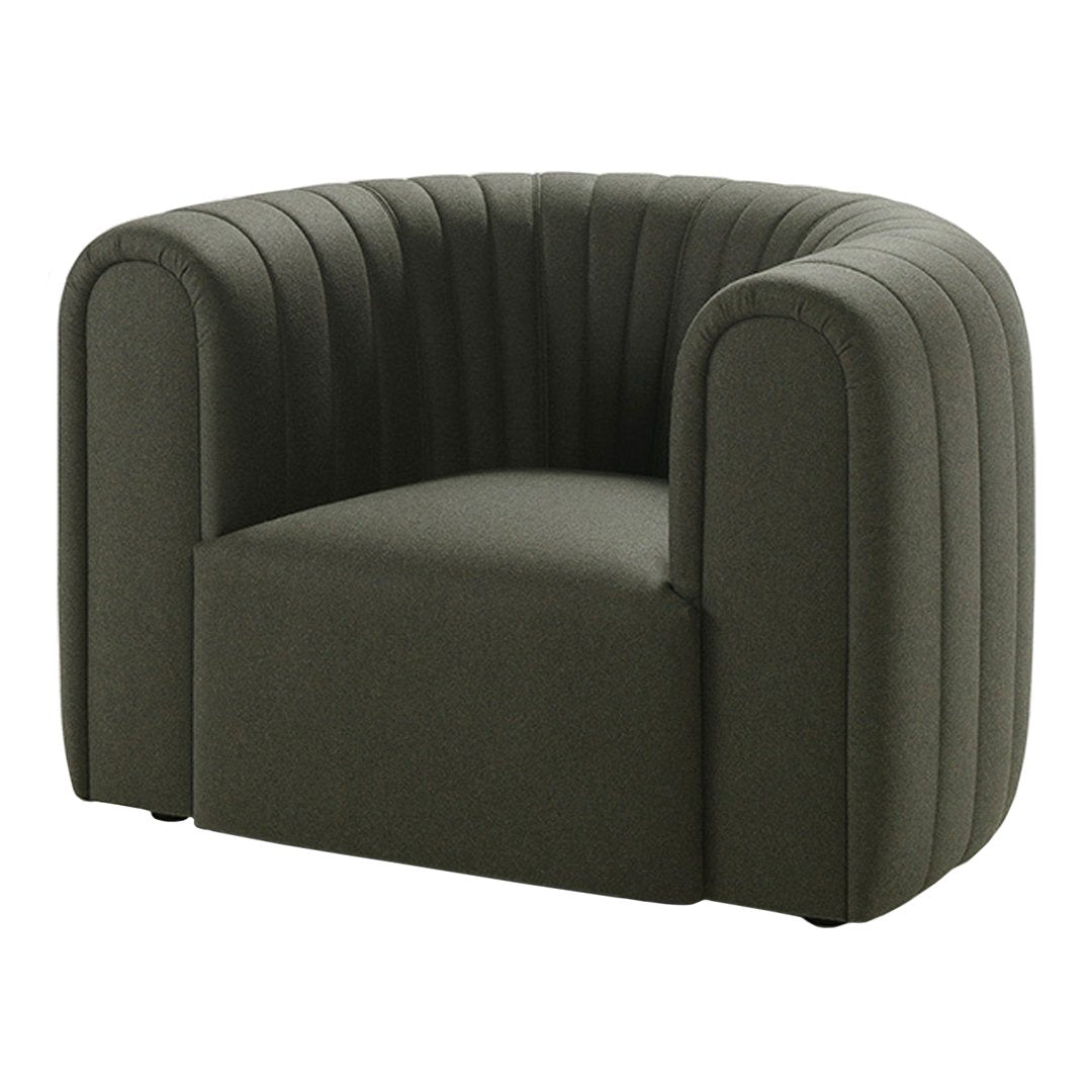 Stylish dark green velvet armchair with vertical ribbed pattern, perfect for modern decor.