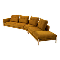 Velvet sectional sofa in a rich mustard hue with tufted cushions and sleek wooden legs. Perfect for modern decor.