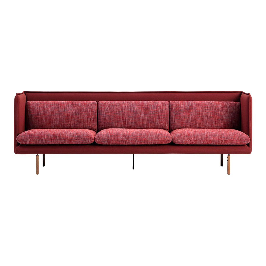 Red fabric sofa with a textured pattern and wooden legs, offering a modern and stylish accent for any living space.