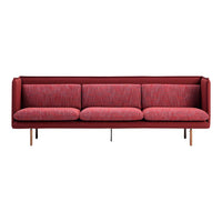 Red fabric sofa with a textured pattern and wooden legs, offering a modern and stylish accent for any living space.
