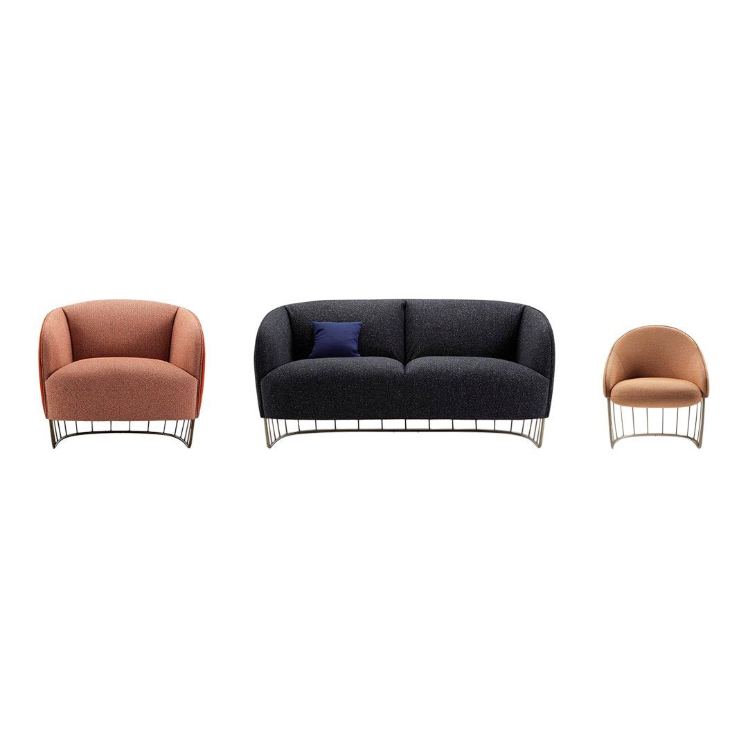 "Stylish 3-piece sofa set in coral, navy, and peach hues with a modern wire frame."