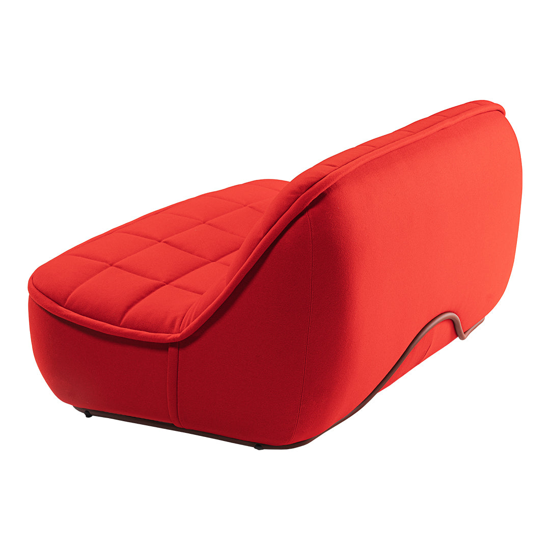 Sleek red chaise lounge with a quilted pattern, perfect for modern home decor.