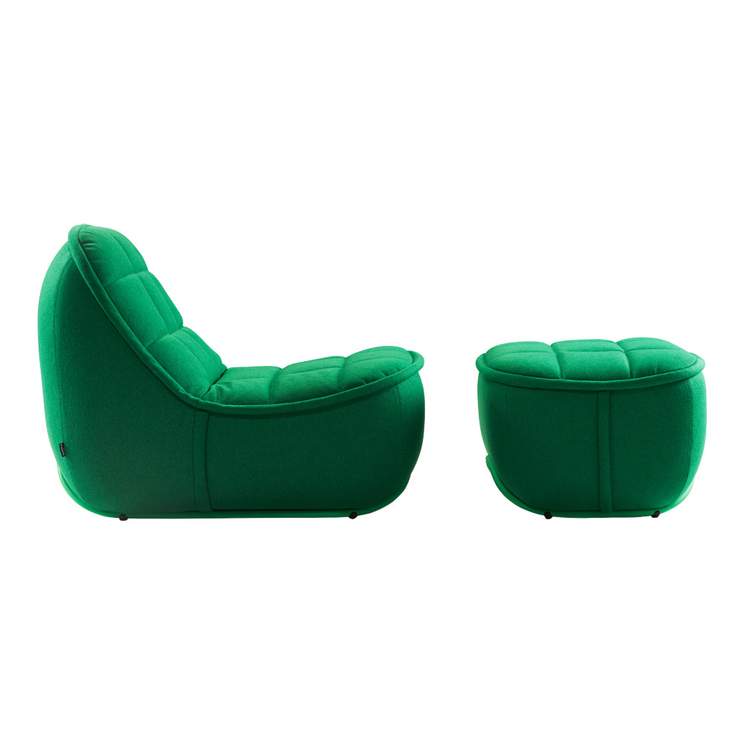 Green upholstered chair and ottoman with tufted patterns, offering a modern and vibrant look for any space.