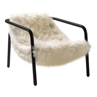 White faux fur lounge chair with sleek black metal frame, featuring a modern and minimalist design. Ideal for cozy spaces.