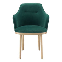 Green velvet chair with a smooth finish and natural wooden legs, featuring a modern, minimalist design.