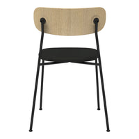 Black metal frame chair with a natural wood backrest and smooth black seat, featuring minimalist design.