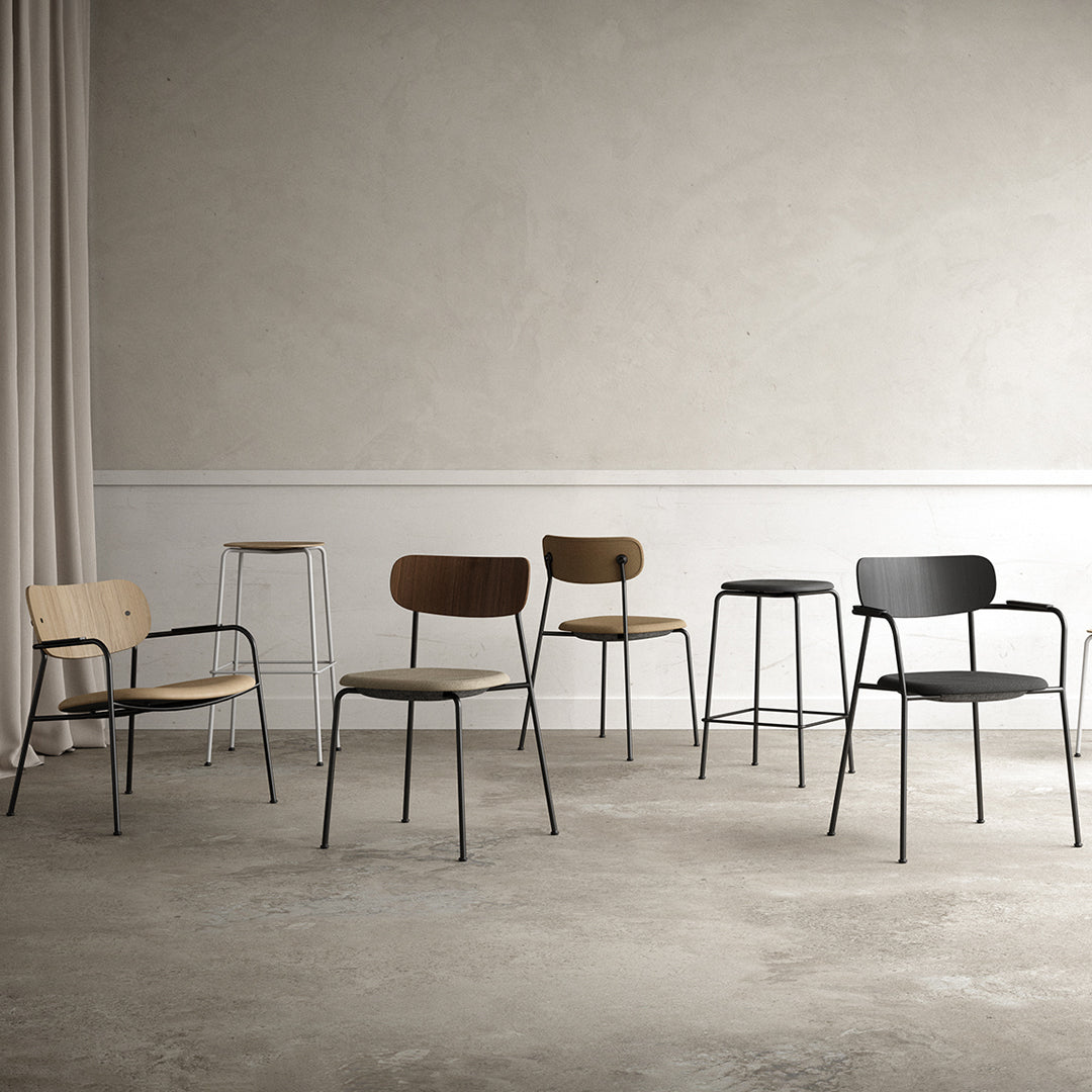 Set of six modern chairs featuring natural wood, dark brown, black, and sleek metal finishes against a neutral background.
