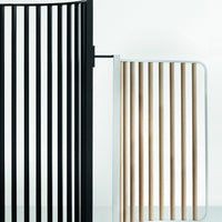 Modern design featuring black vertical slats paired with natural wood tones, creating a striking contrast in patterns.