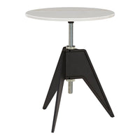 White round tabletop with a sleek black metal base and angular legs, creating a modern and minimalist design.