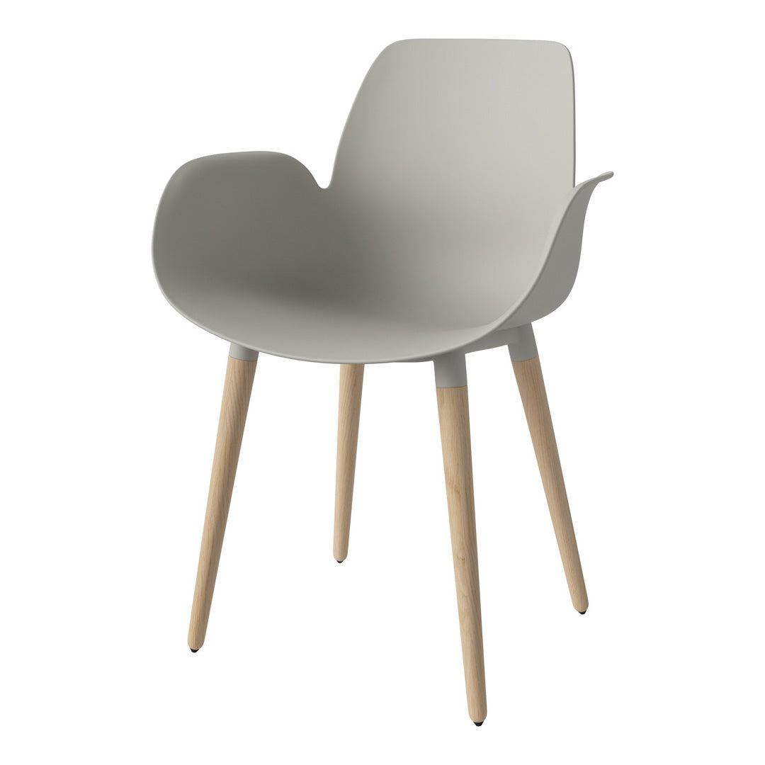 Light gray minimalist chair with curved armrests and natural wooden legs. Perfect for modern home décor.
