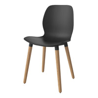 Black chair with a smooth, modern design and natural wood legs. Perfect for contemporary interiors.