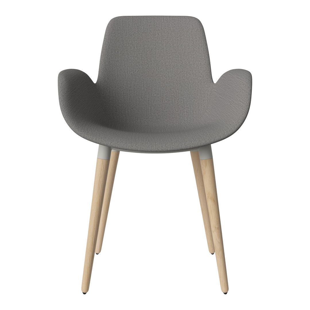 Gray textured chair with light wooden legs, featuring a modern, minimalist design. Ideal for stylish interiors.