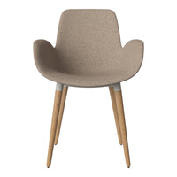 Beige textured chair with light wood legs, featuring a minimalist design and soft, inviting color palette.