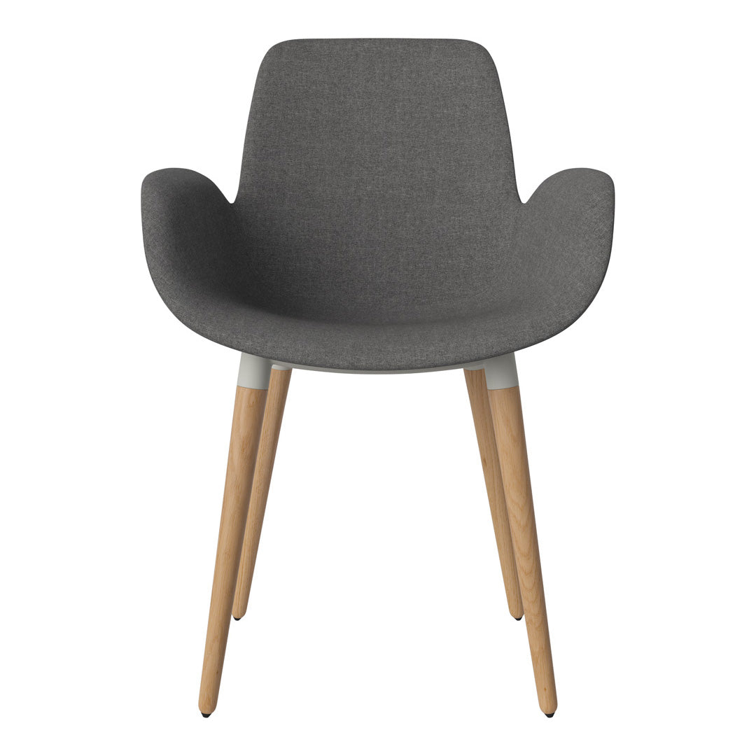 Gray upholstered chair with wooden legs and smooth texture, featuring a modern, minimalist design.