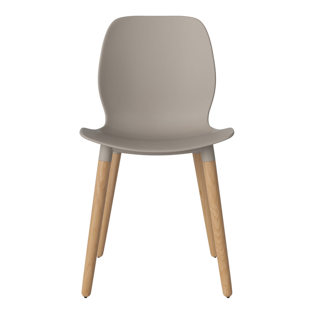 Soft gray chair with a smooth, matte finish and natural wooden legs, perfect for modern decor.
