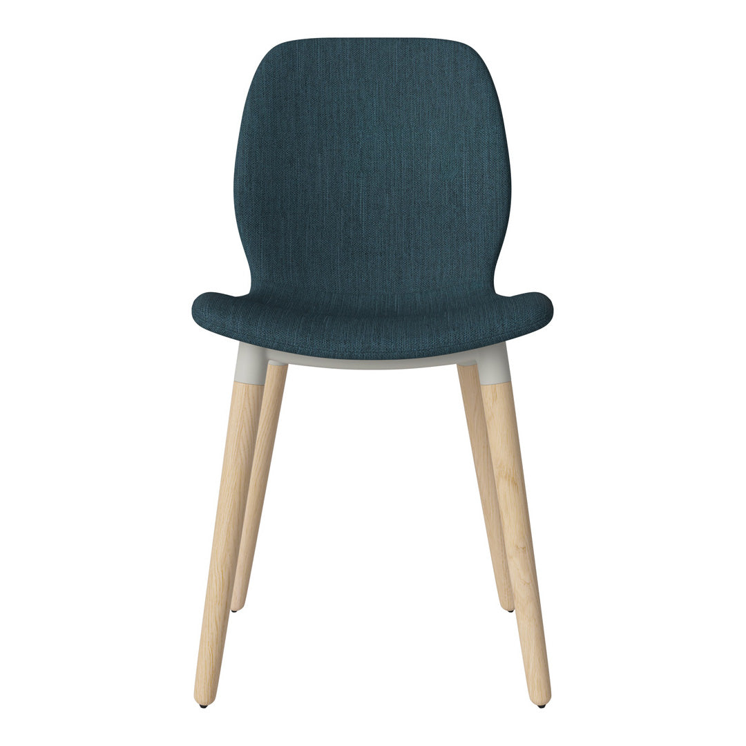 Stylish chair featuring a teal fabric seat and light natural wood legs, adding a modern touch to any space.