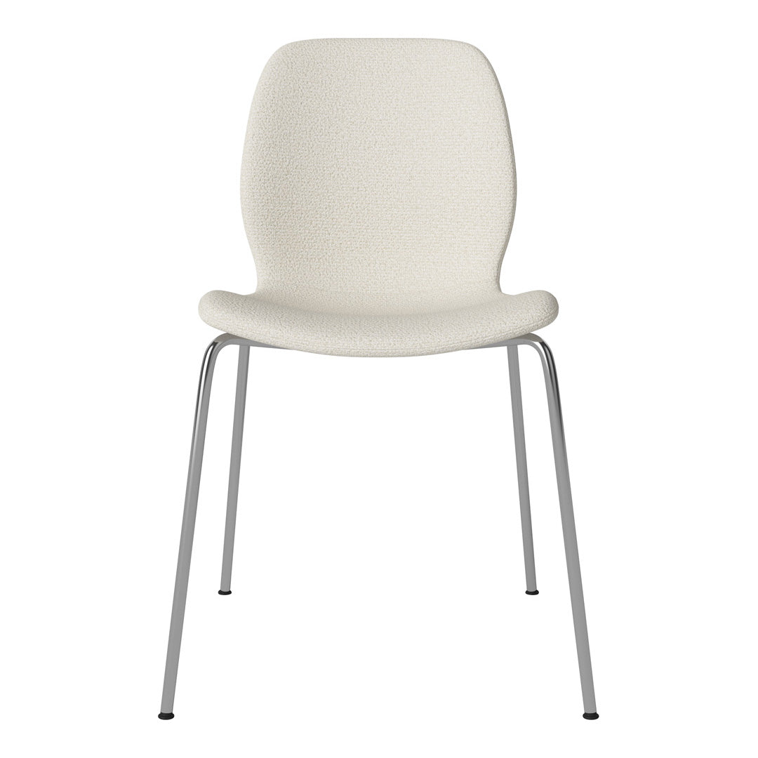 Textured off-white chair with sleek silver legs, perfect for modern decor.