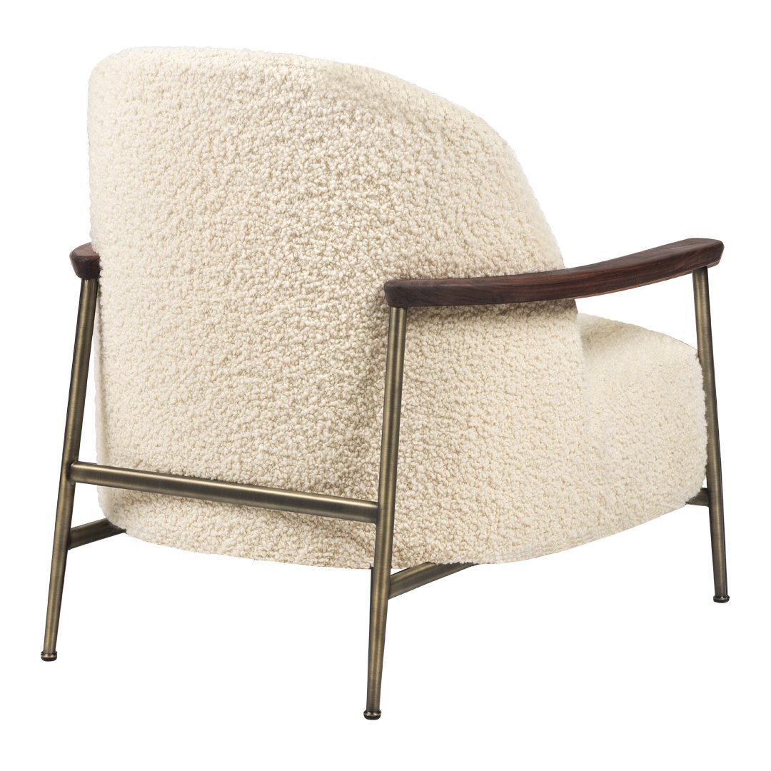 Cream-colored upholstered chair with textured boucle fabric and walnut wood accents. Vintage mid-century modern design.