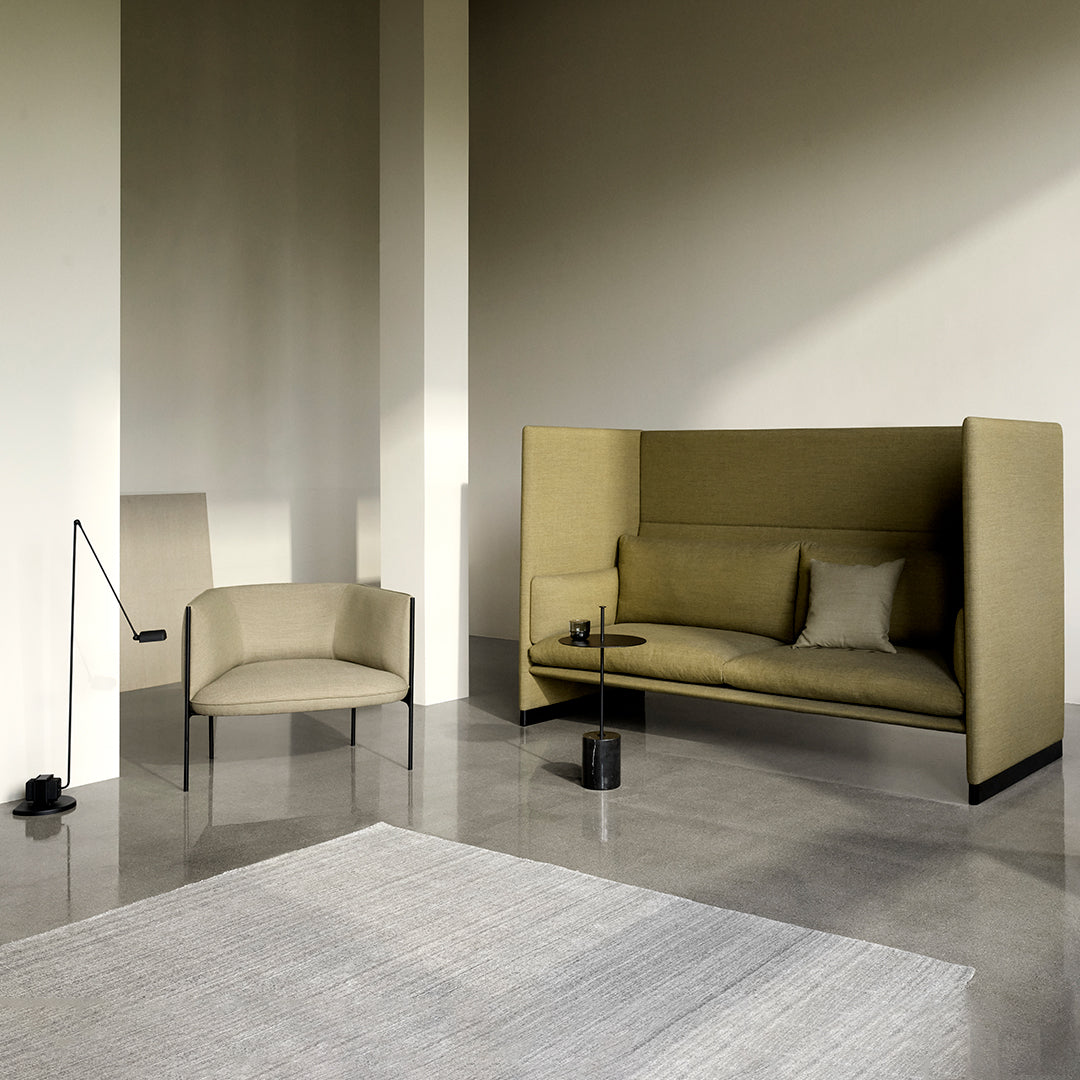 Olive green furniture set with minimalist design, featuring solid lines and soft textures against a neutral background.