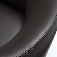 Dark brown, smooth leather upholstery with subtle texture and sleek curved edges, ideal for modern decor.
