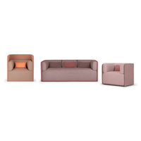 Modern sofa set featuring soft pink and beige fabrics with orange accent cushions and sleek, minimalist design.
