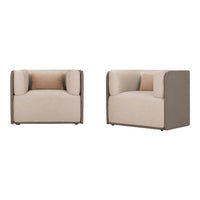 Beige and taupe upholstered armchairs with smooth textures and subtle contrasting pillows.