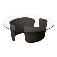 Round glass top coffee table with sleek dark wood base featuring a unique curved design. Modern and stylish look.