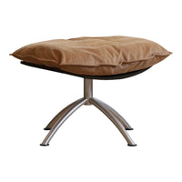 Tan plush cushion on a sleek silver metal base, featuring a minimalist design. Perfect for modern decor.
