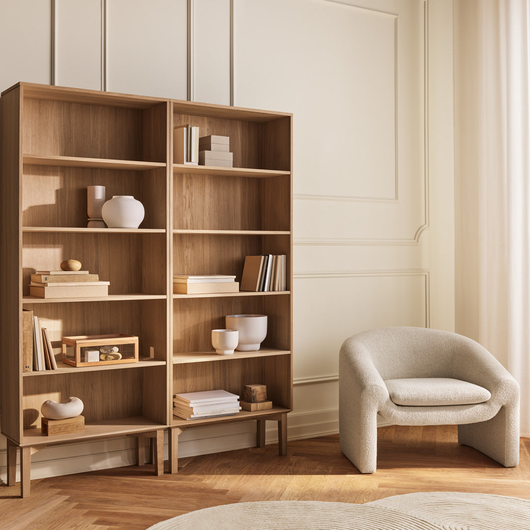 Natural wood tones with a light finish, complemented by neutral white and soft beige accents in a minimalist design.