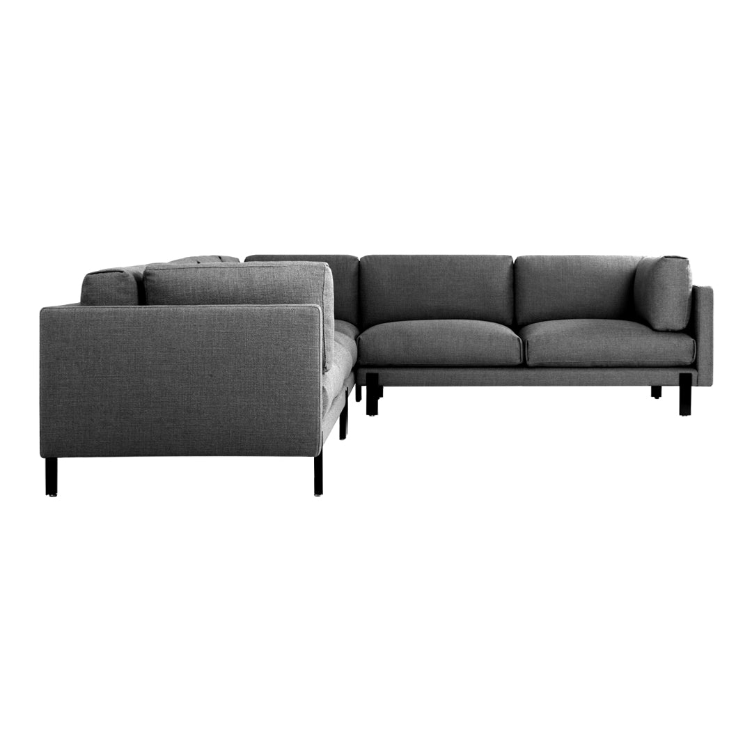 Modern gray sectional sofa with smooth fabric and sleek black legs, featuring a minimalist design.