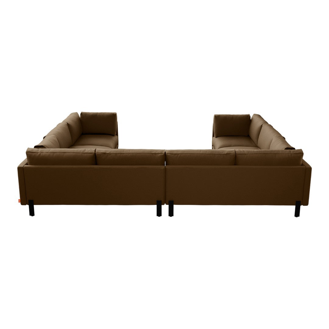 Brown sectional sofa with smooth fabric and minimalist design, featuring black legs for a modern look.