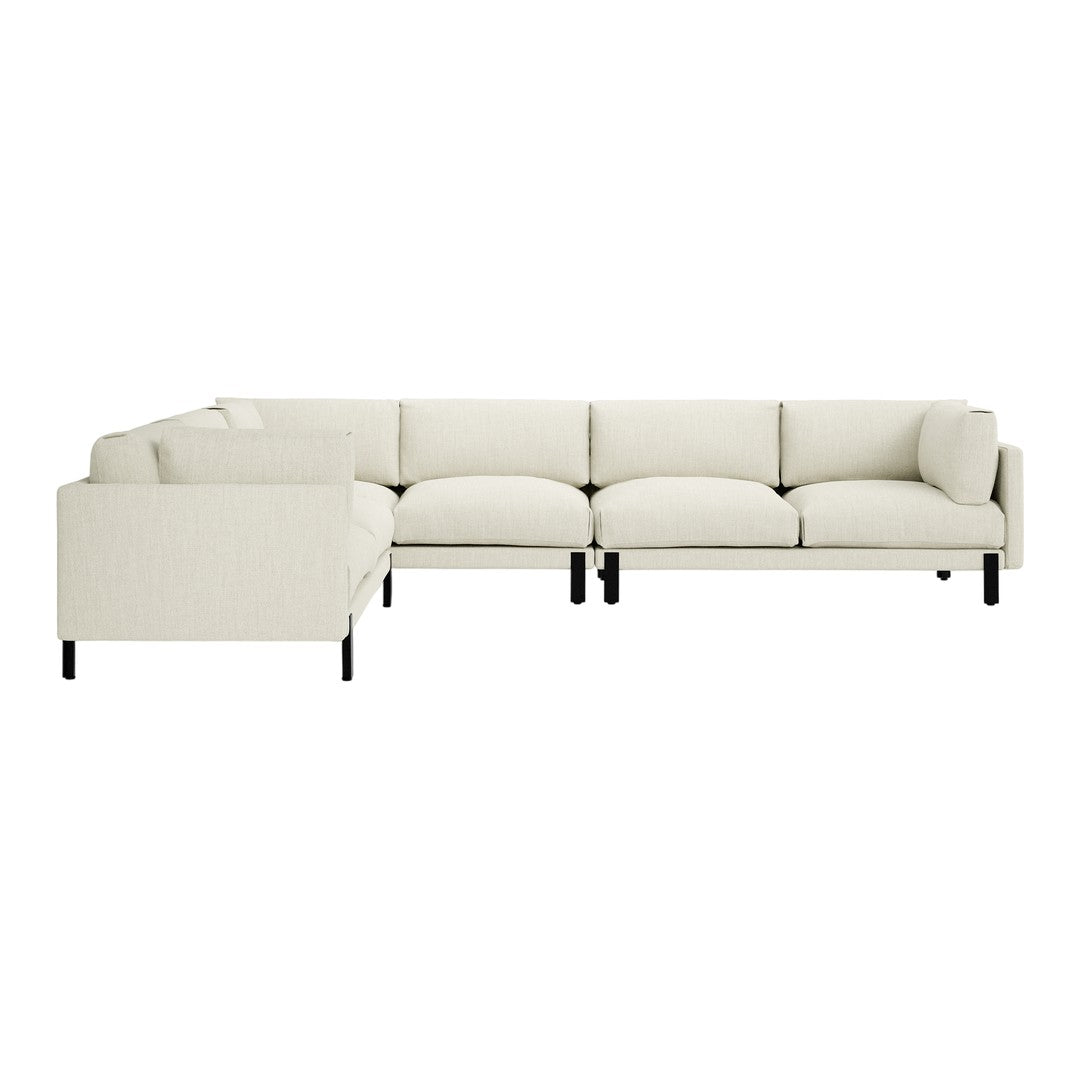 Light beige sectional sofa with a textured fabric and black legs, offering a modern and minimalist design.