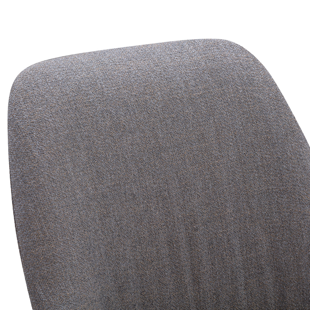Gray textured fabric with a subtle, woven pattern, perfect for modern furniture designs.