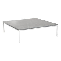 Gray square tabletop with a smooth finish, complemented by sleek silver legs. Modern minimalist design.