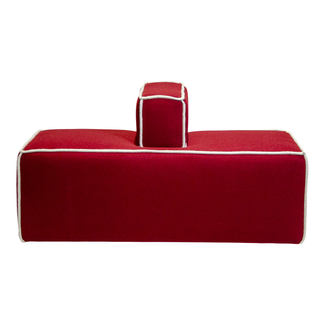 Red rectangular cushion with white piping detail, featuring a block-shaped design for stylish comfort.