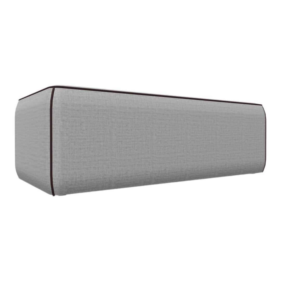 Gray fabric bench with subtle texture and dark brown piping detailing. Ideal for modern decor.