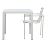 White minimalist square table with a matching translucent chair, featuring a clean, modern design and smooth surfaces.