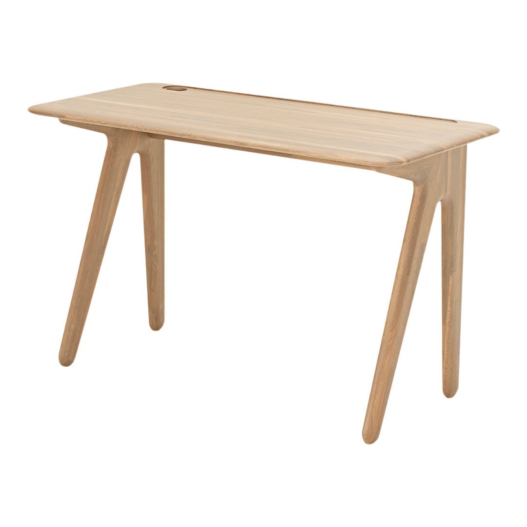 Light oak wood desk with a smooth surface and minimalist design, featuring clean lines and tapered legs.