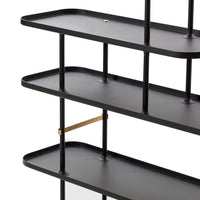 Black metal shelving unit with sleek, smooth surfaces and elegant gold accents. Modern, minimalist design.