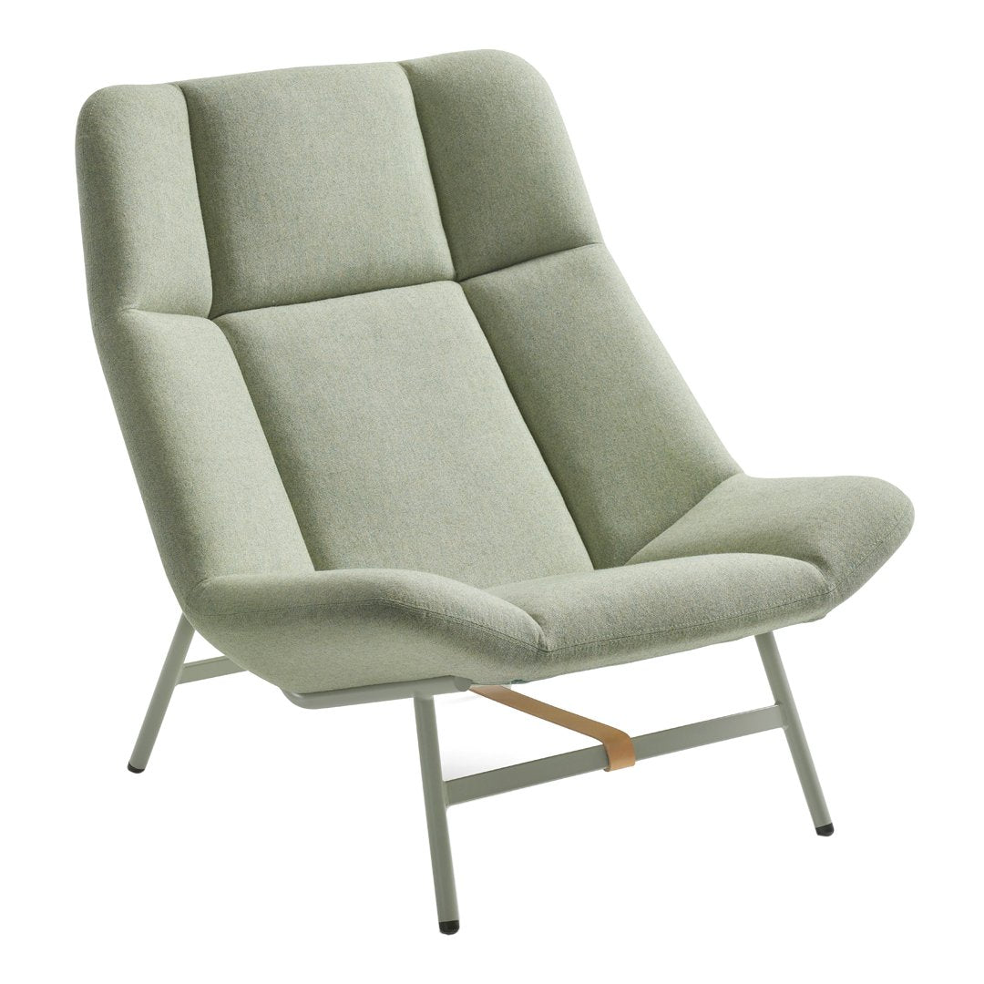 Light green modern lounge chair with a clean, minimalist design and soft, textured upholstery.