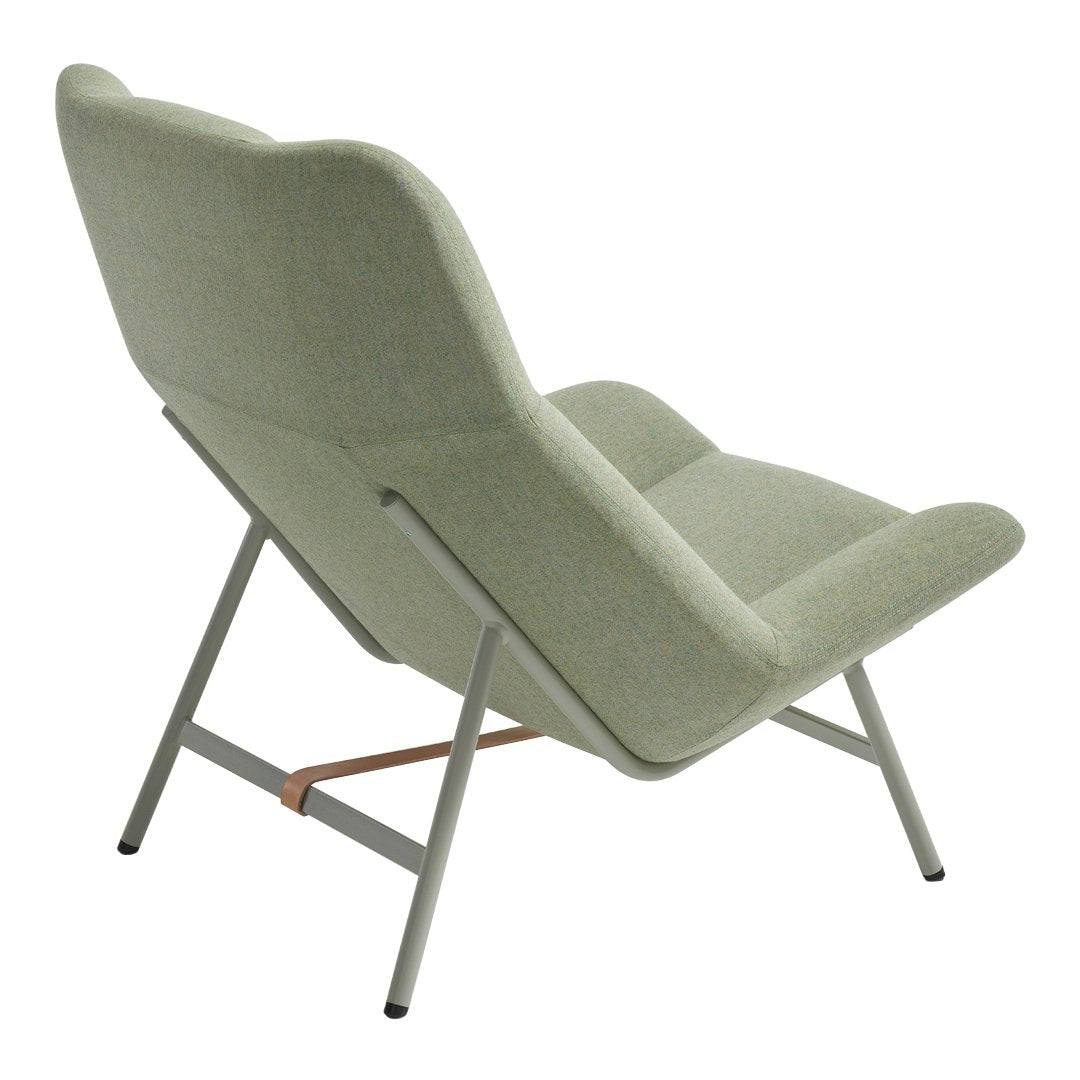 Light green upholstered chair with smooth curves and a minimalist metal frame. Stylish and modern design.