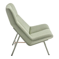 Light green upholstered chair with sleek lines and minimalist design on a white background.