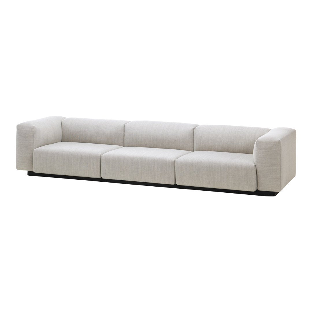 Modern beige sofa with a smooth texture and clean, minimalist lines. Perfect for any contemporary living space.