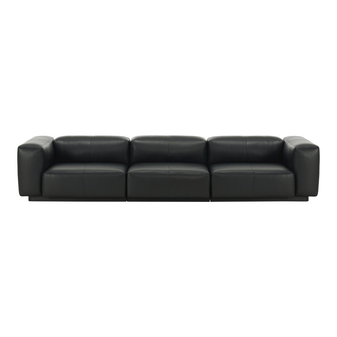 Black leather sofa with smooth texture and minimalist design, featuring a solid color without patterns.