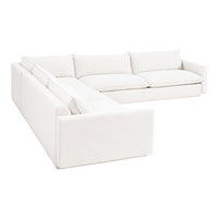 "Cozy, textured white sectional sofa with soft cushions, perfect for modern living spaces."
