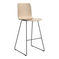 Light wood stool with a smooth, natural finish and sleek black metal legs, featuring a minimalist design.